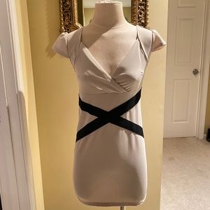 Beautiful Cream Body-Con Dress with Black Details